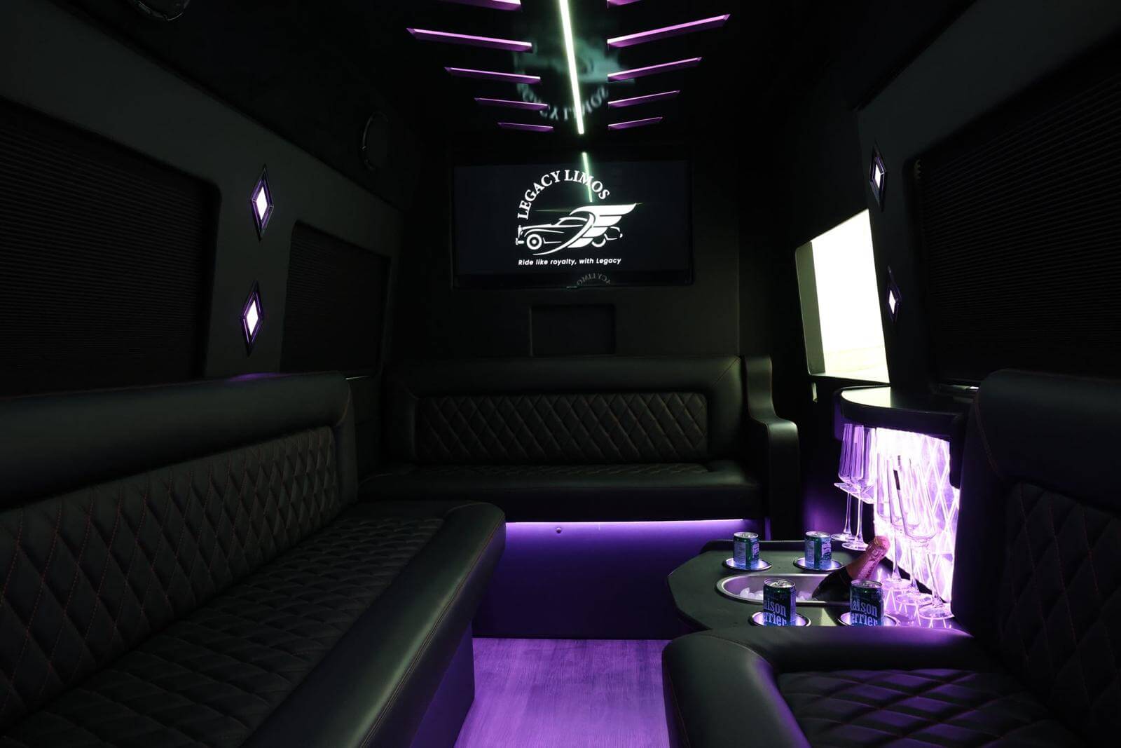Legacy Limos Sprinter interior — quilted leather, LED lounge lighting and champagne bar (1)
