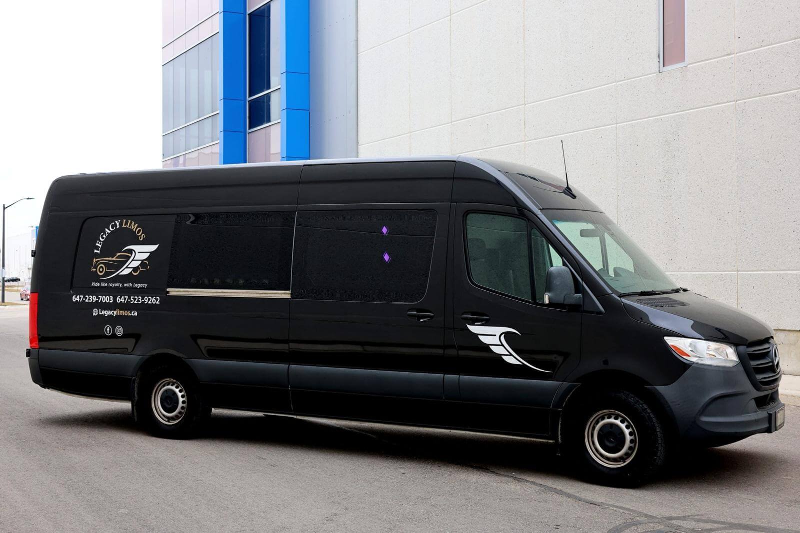 Black luxury Mercedes-Benz Sprinter party bus from Legacy Limos